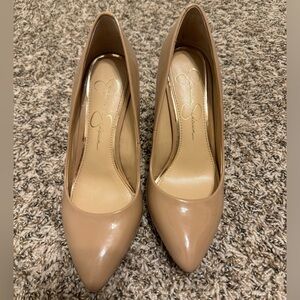 Jessica Simpson 6.5 patent nude pump. Little scratch on back left.